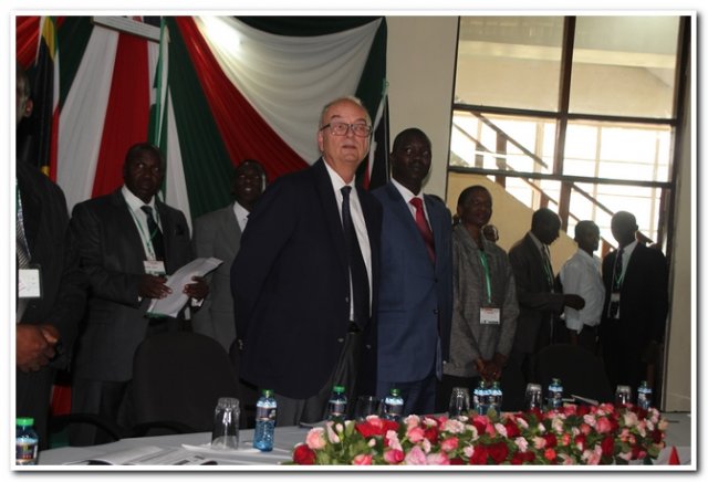 high table followimg the script for the national anthem while standing